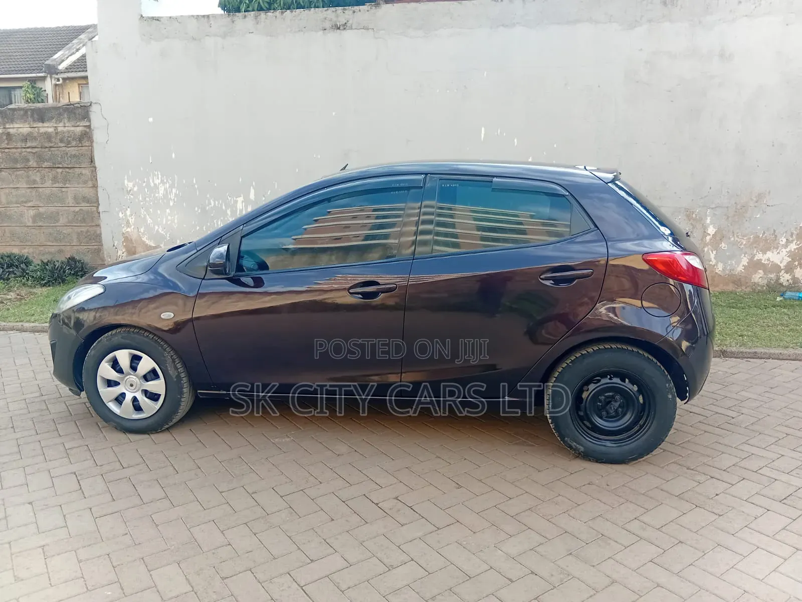 Mazda Demio 2012 Brown