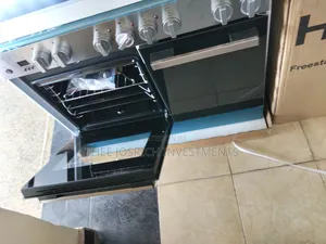 Haier 4+2 Cooker Size 90 by 60 With Gas Compartment