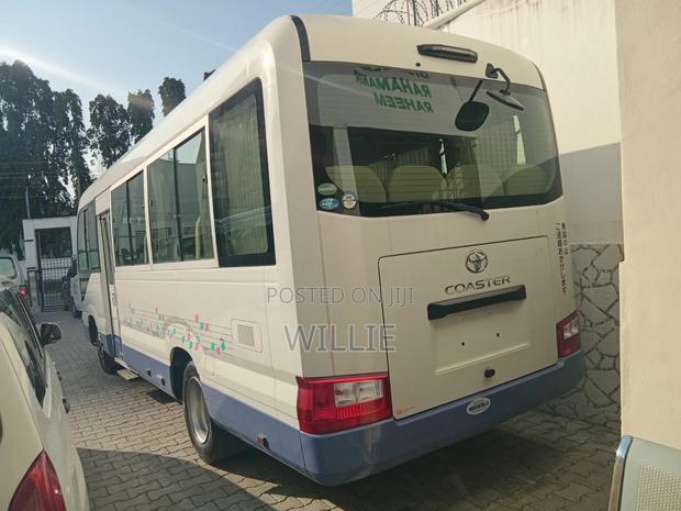 Toyota Coaster 2019 White - thumbnail 4