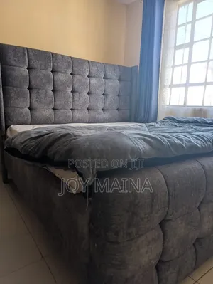 Modern 6x6 Upholstered Bed With a Charcoal Grey Tufted Headboard