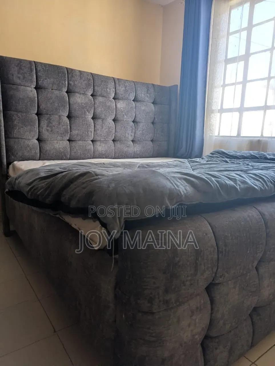Modern 6x6 Upholstered Bed With a Charcoal Grey Tufted Headboard
