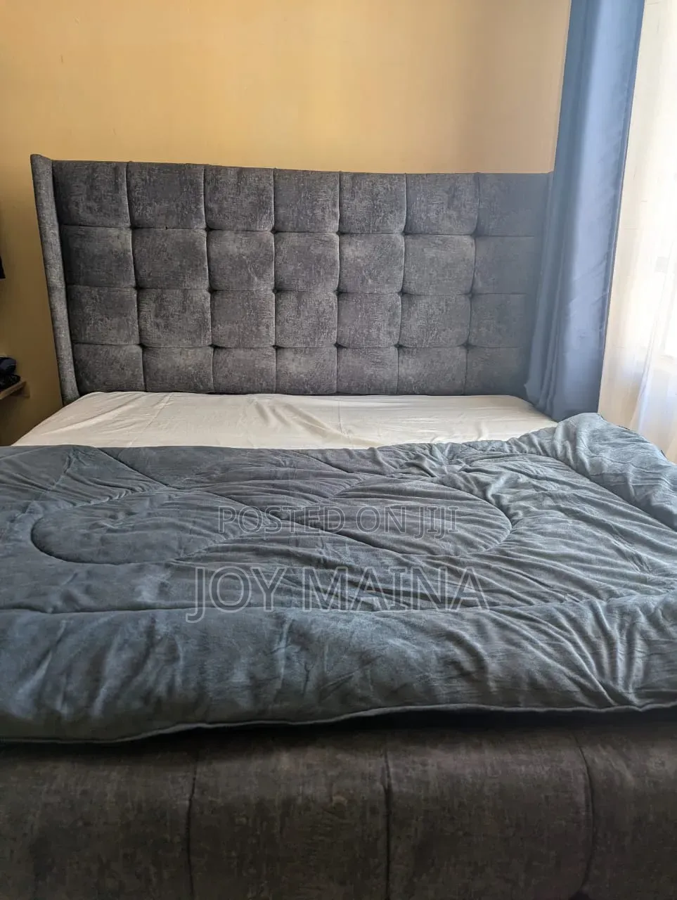 Modern 6x6 Upholstered Bed With a Charcoal Grey Tufted Headboard