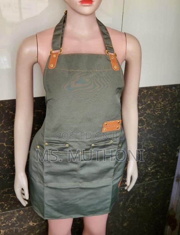 Heavy-Duty Fabric, Adjustable Leather-Accented Straps Aprons