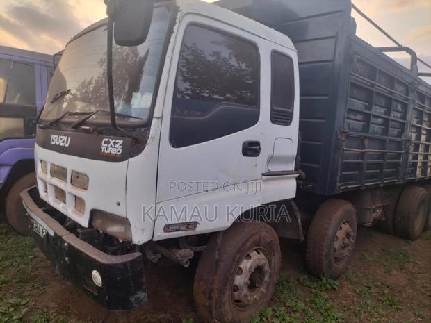 Isuzu CXZ Double Steering 2013 White - thumbnail 2