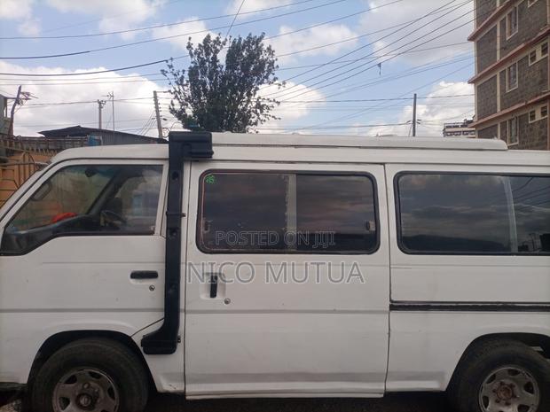 Nissan Caravan (Urvan) 2000 White - thumbnail 4