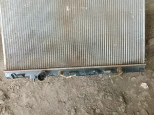 Radiator Lancer Cedia
