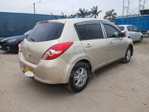 Nissan Tiida 2010 Beige