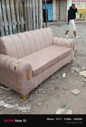 A Cream 3 Seater Sofa