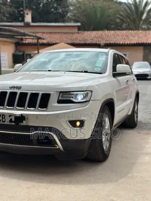 Jeep Grand Cherokee Limited 4dr SUV 4WD (3.6L 6cyl 8A) 2014 White
