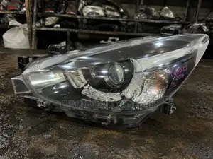 Mazda Demio DJ 2014–2015 Genuine Front Headlight