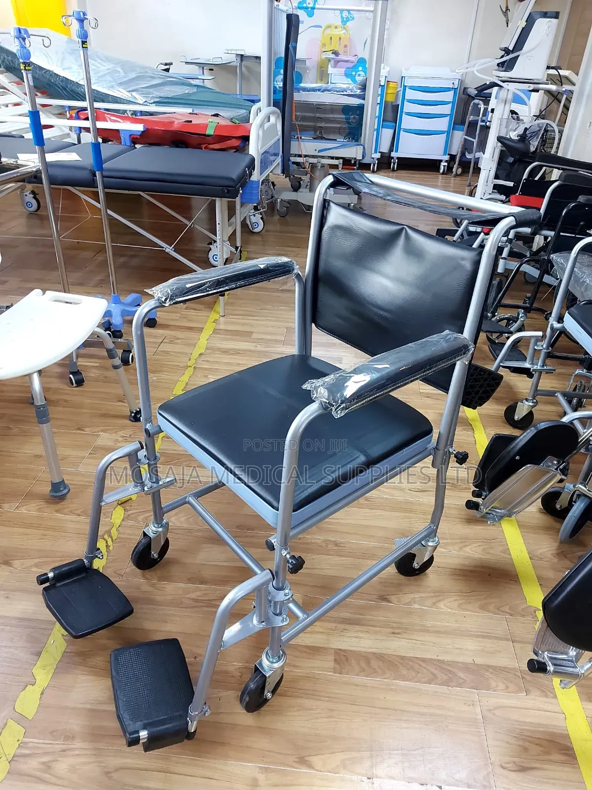 Commode Chair With Backrest and Castors and Footrest