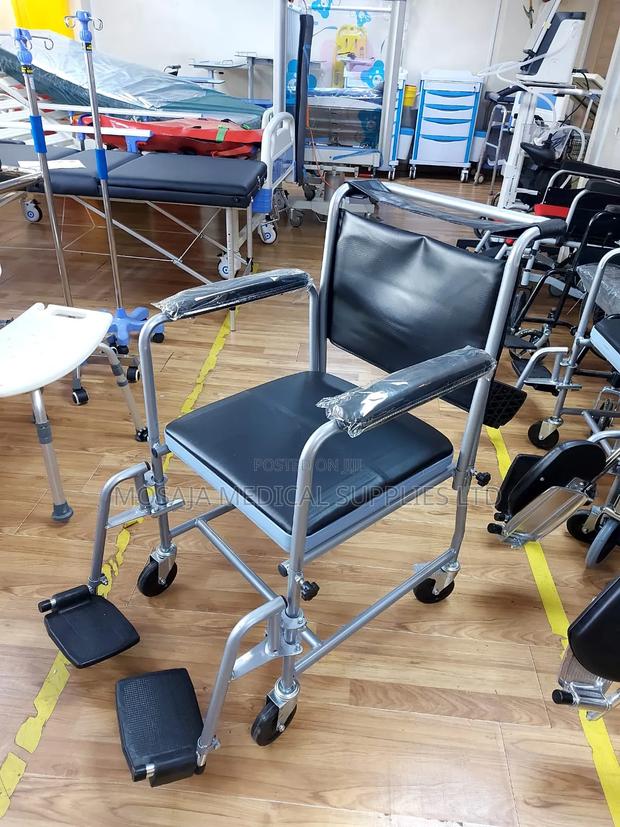 Commode Chair With Backrest and Castors and Footrest