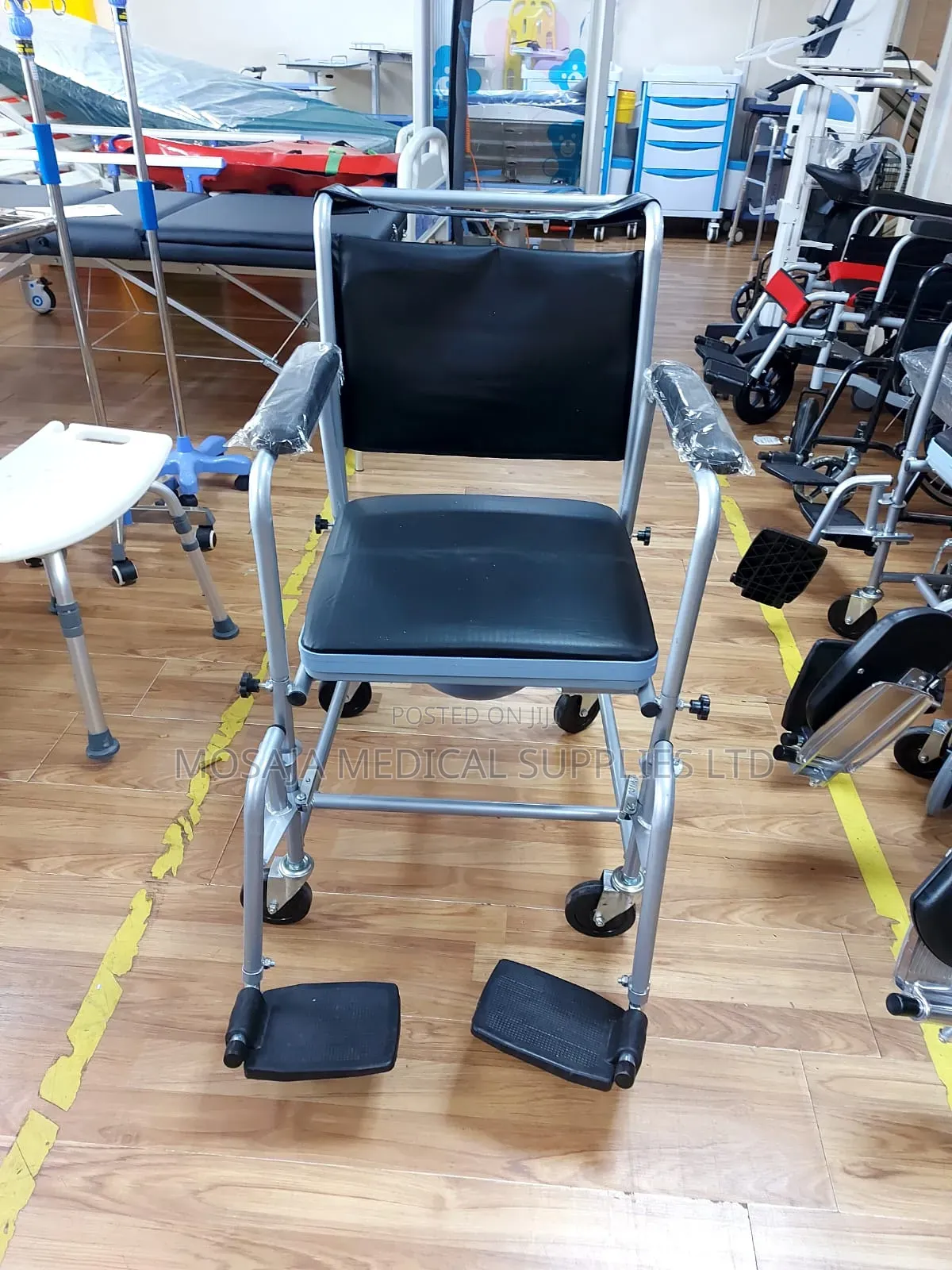 Commode Chair With Backrest and Castors and Footrest