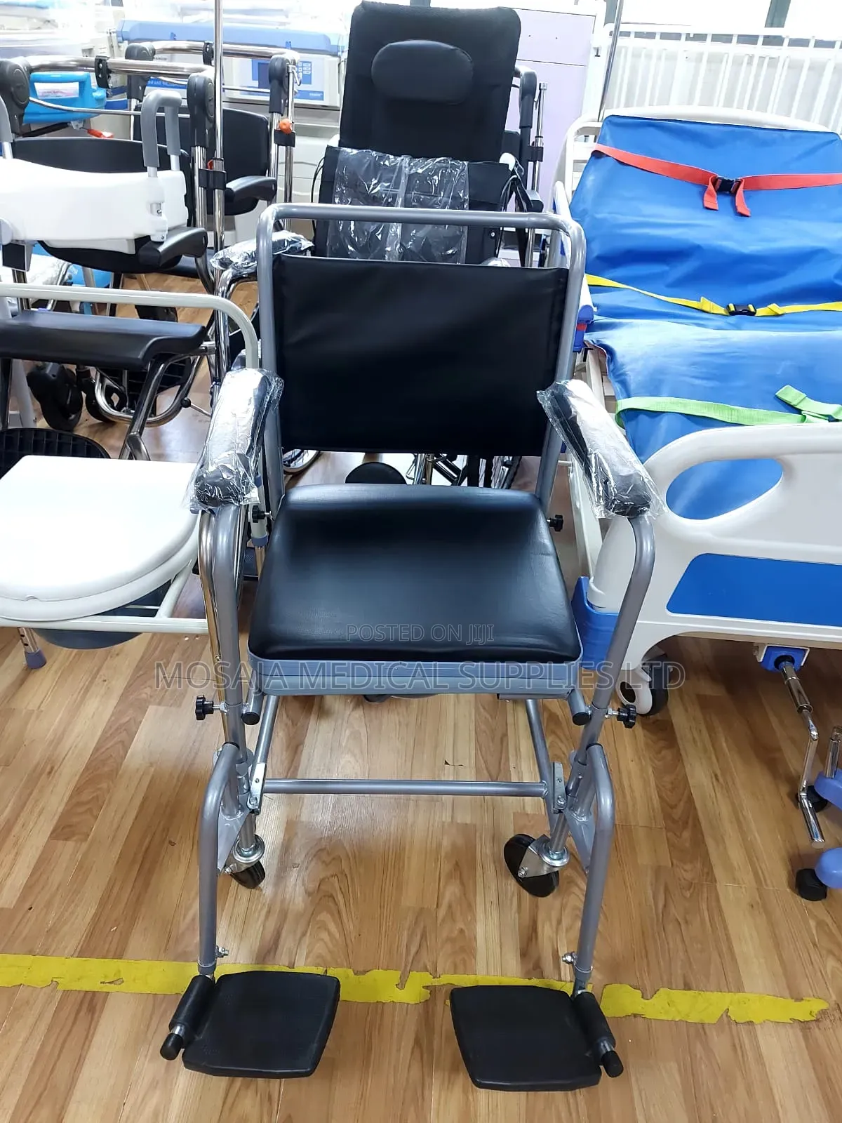 Commode Chair With Backrest and Castors and Footrest