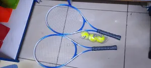 Tennis Racket and 3 Tennis Balls