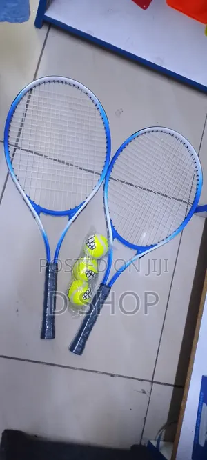Tennis Racket and 3 Tennis Balls
