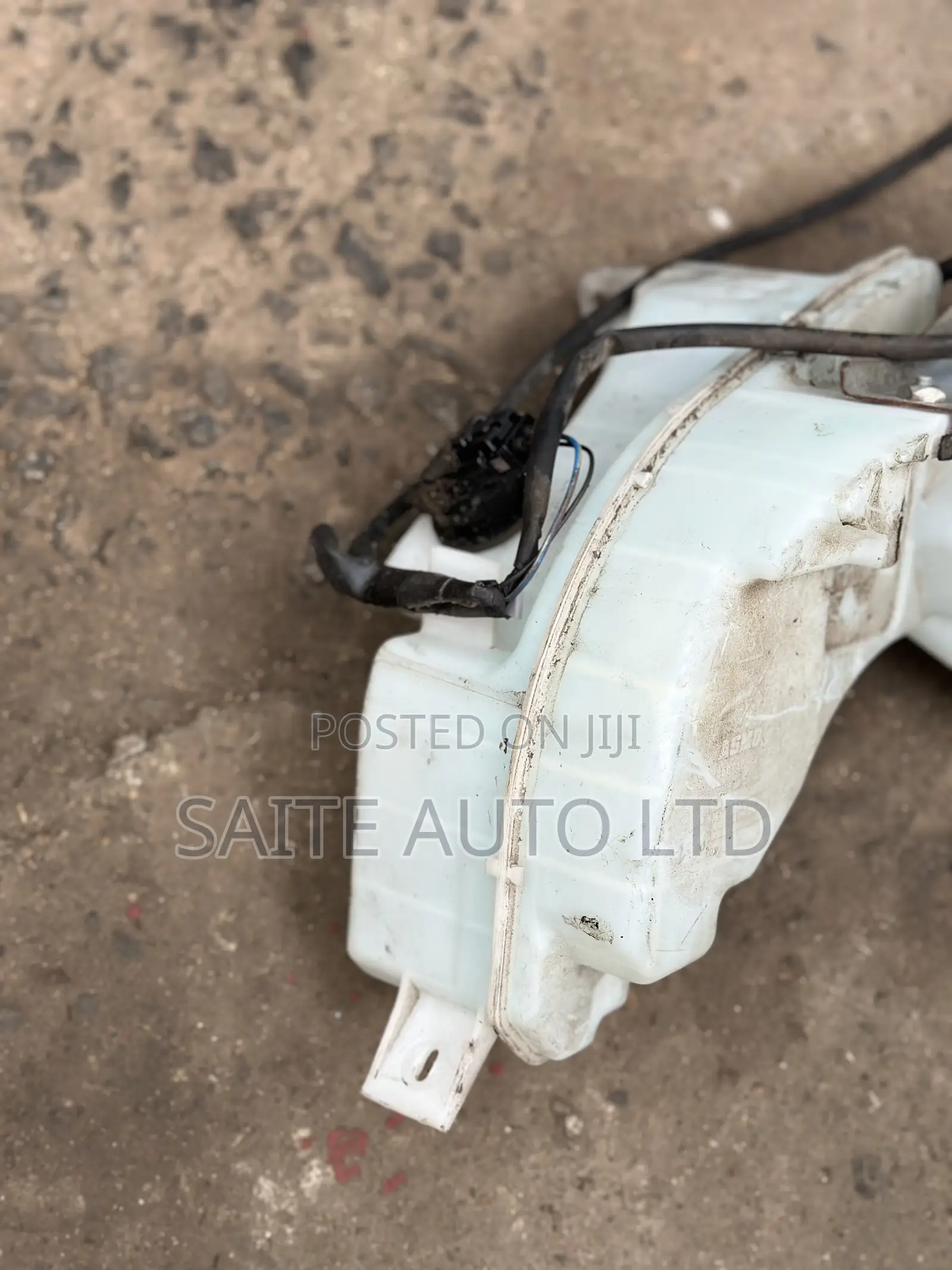 Washer Bottle - Mazda