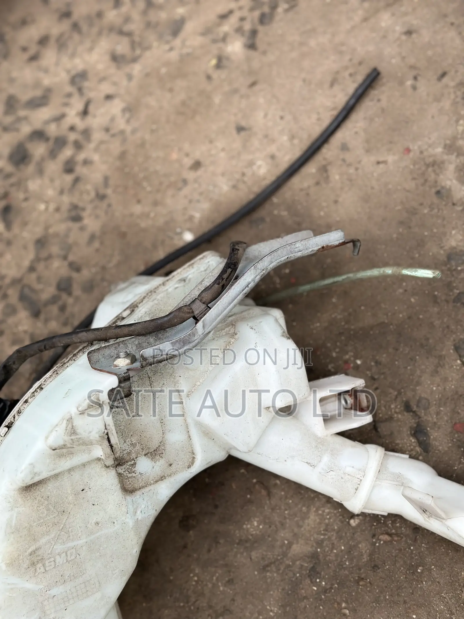 Washer Bottle - Mazda