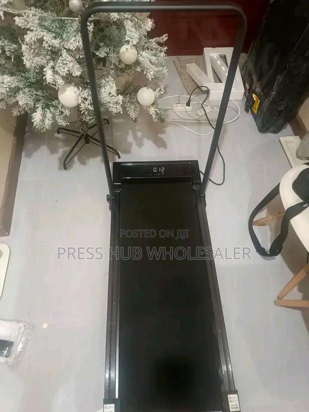 Foldable 2-in-1 Walking Pad Treadmill With Support Handlebar - main view