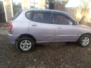 Toyota Duet 2004 Beige