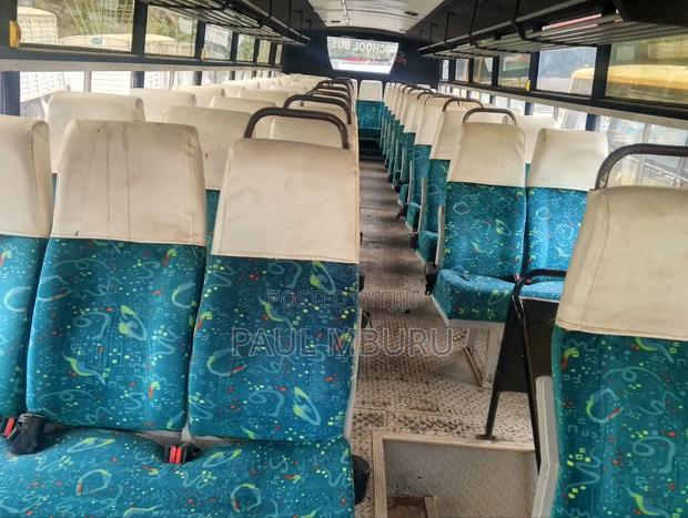 Isuzu Executive Bus 1997 Yellow - thumbnail 3