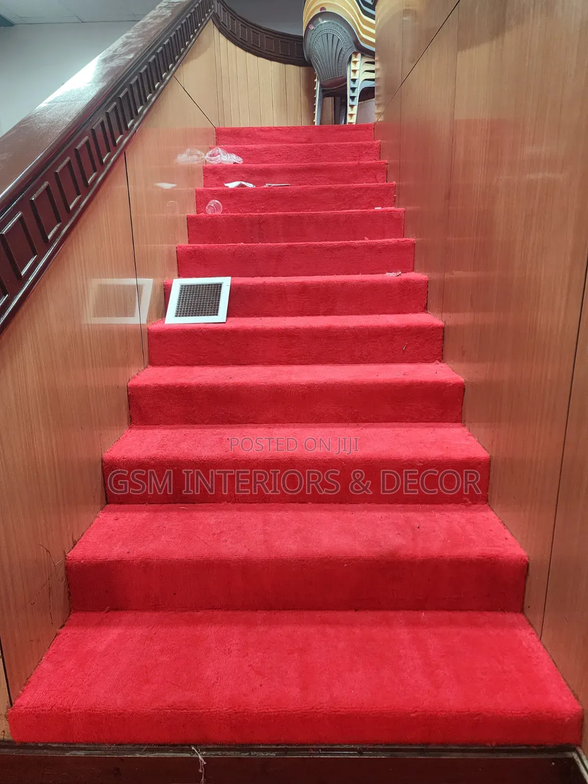 Wall to Wall Red Carpet Post Installation on Stairway