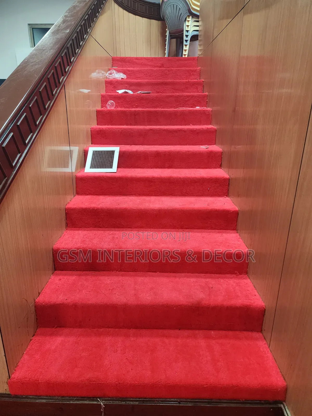 Wall to Wall Red Carpet Post Installation on Stairway