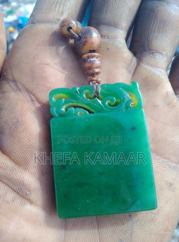 Genuine Carved Green Gemstone Pendant - main view
