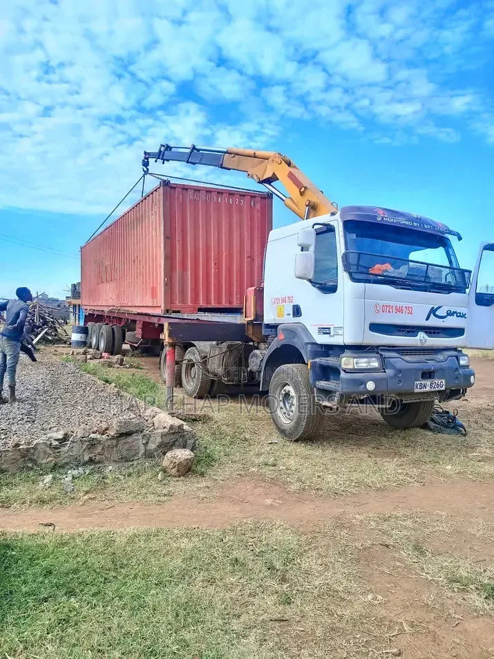 Trailer With Crane Readily Available for Logistics Services
