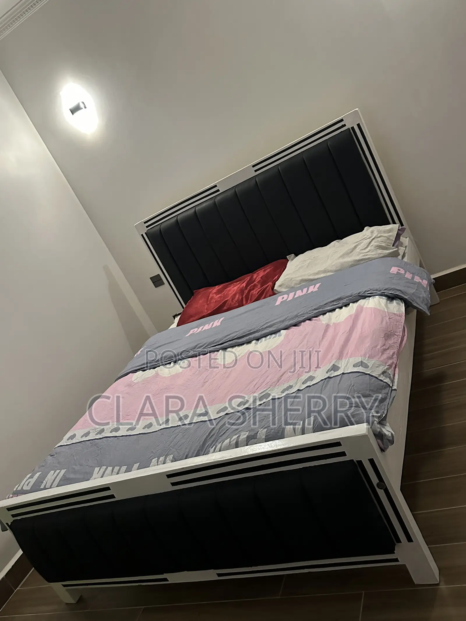 5 by 6 Black and White Slightly Used Mocket BED