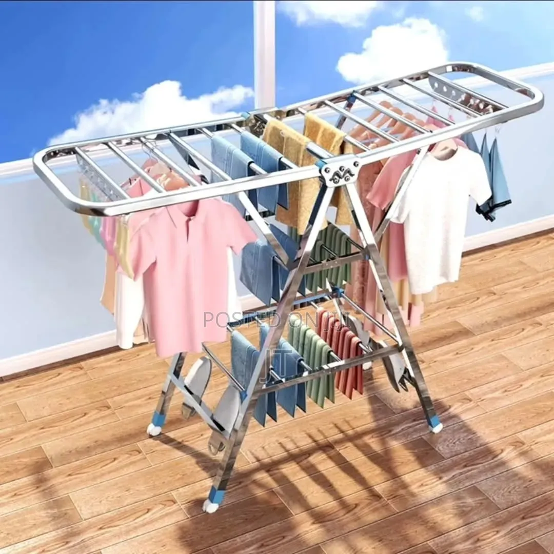 Movable Foldable/Portable LAUNDRY DRYING RACK With 9 Hole Hanger