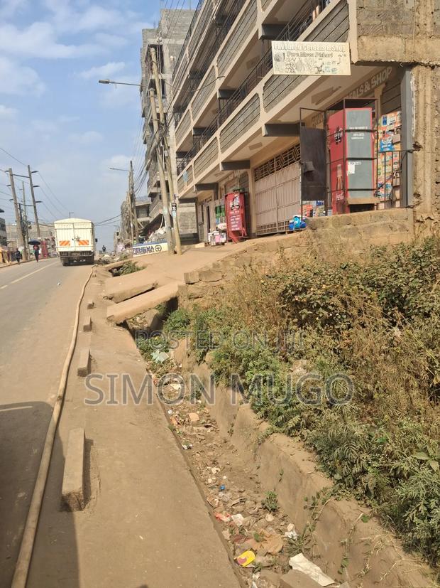 Roysambu Car Wash Area Commercial Plot on Tarmac Road - main view