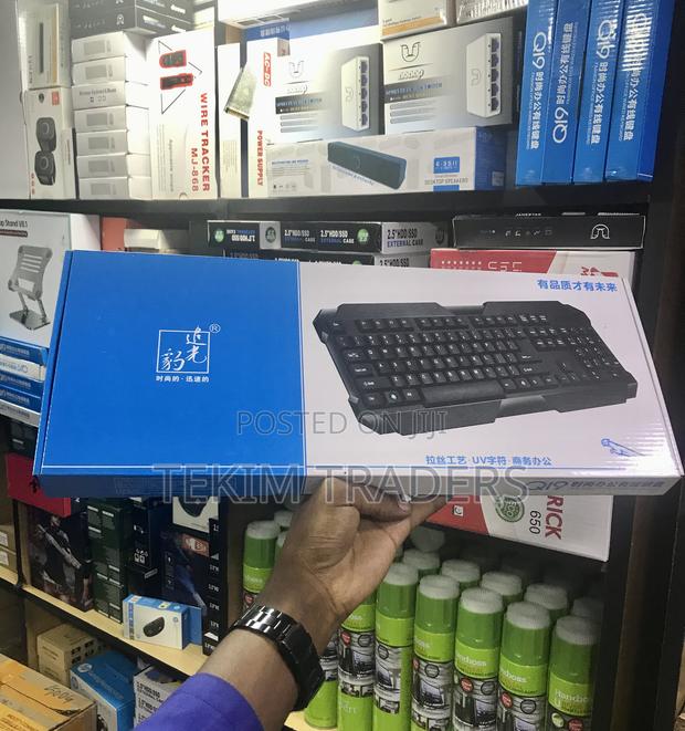 Q19 USB Wired Keyboard - Backlit, Ergonomic, 104 Keys