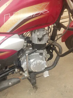 TVS HLX Plus ES 2026 Red