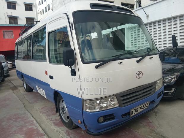 Toyota Coaster 2015 White - thumbnail 2