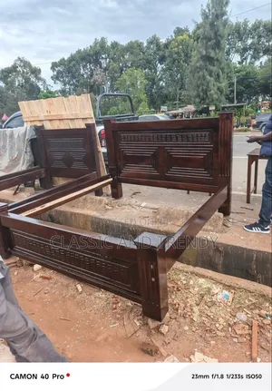 Dark Wooden Bed 5*6