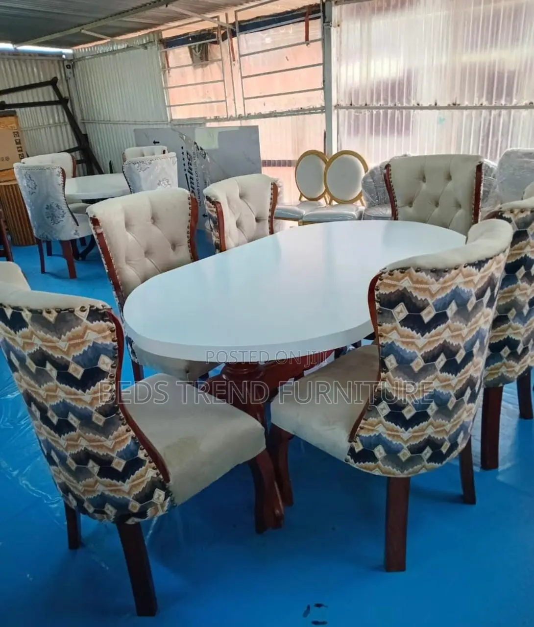 6-Seater Oval Dining Set Tufted Patterned Chairs