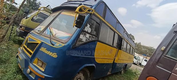 Nissan Caravan (Urvan) 2015 Blue - thumbnail 4