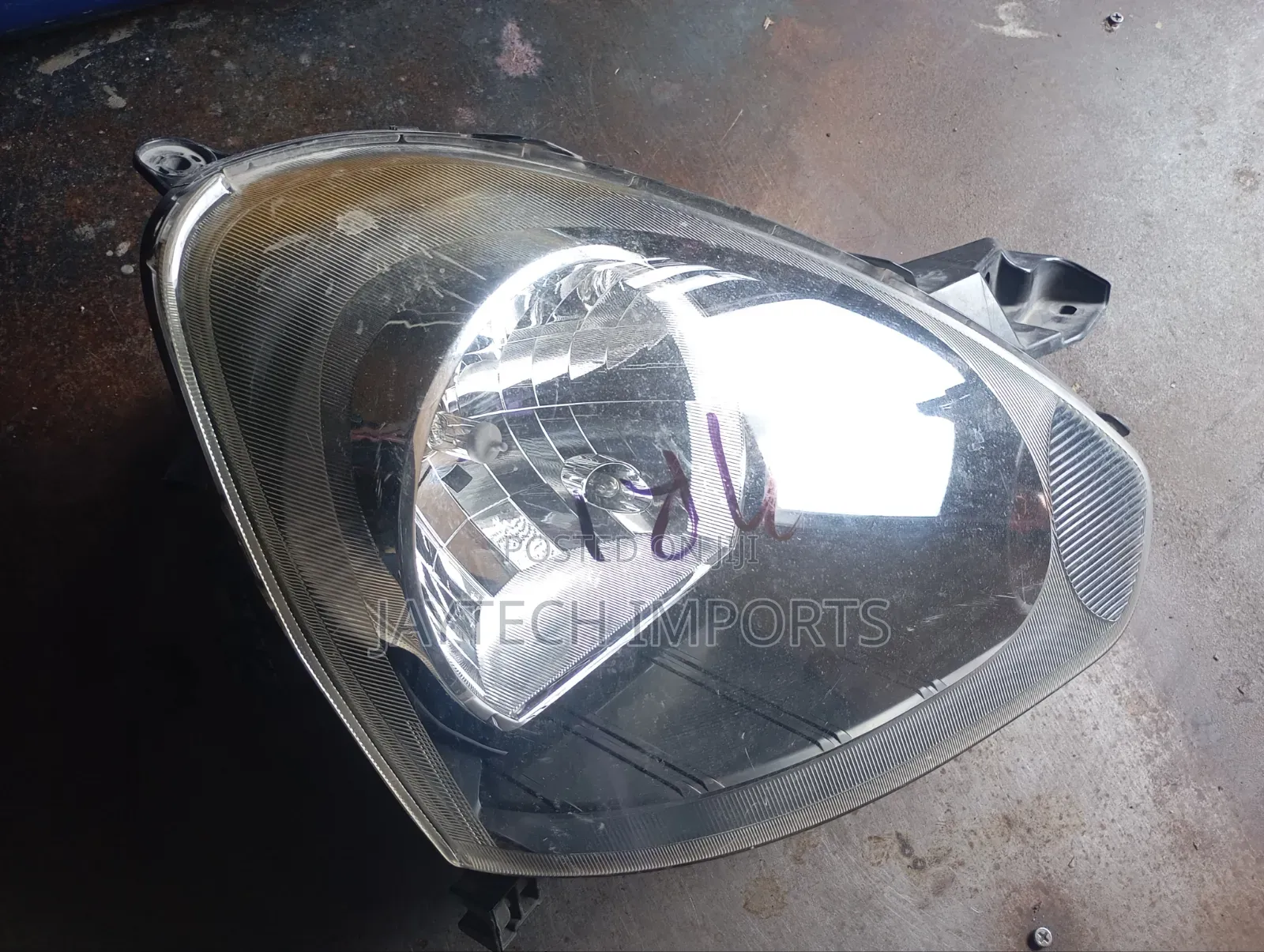 Daihastu Mira Headlight