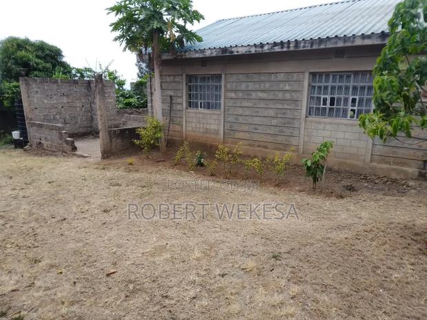 Plot With a Three Bedroom House Another Two Foundation - main view