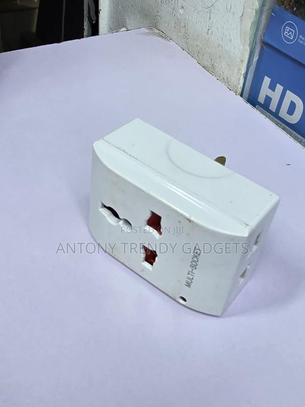Universal 13A Multi Plug Adapter for UK Wall Sockets