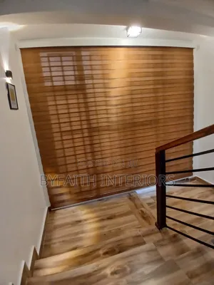 Brown Shade Roll Up Window Blind