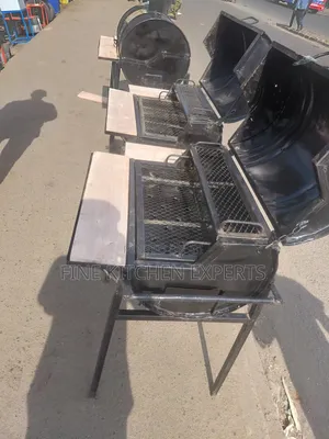 Barbeque Grill With Wooden Sides.