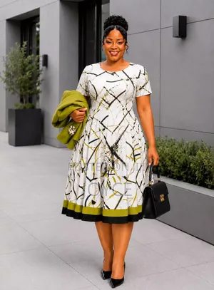 Box Plit Dress With a Plain Coat