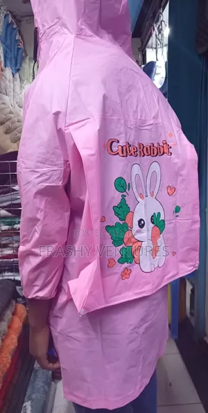Kids Rain Coats With an Allowance for a Back Pack.