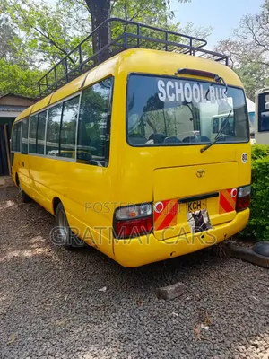 Toyota Coaster 2013 Yellow