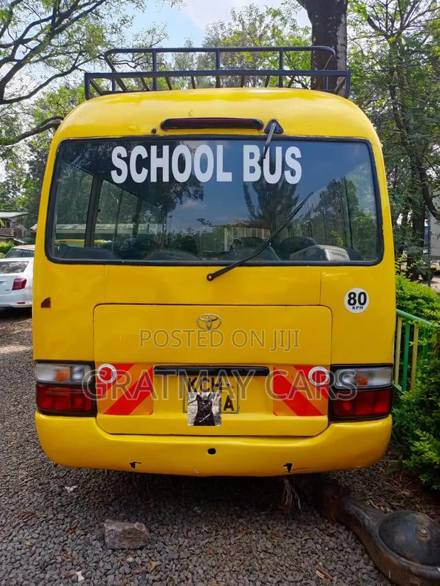 Toyota Coaster 2013 Yellow - thumbnail 4