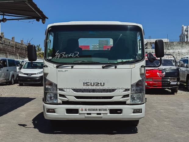 Isuzu Elf Car 2018 White - thumbnail 2
