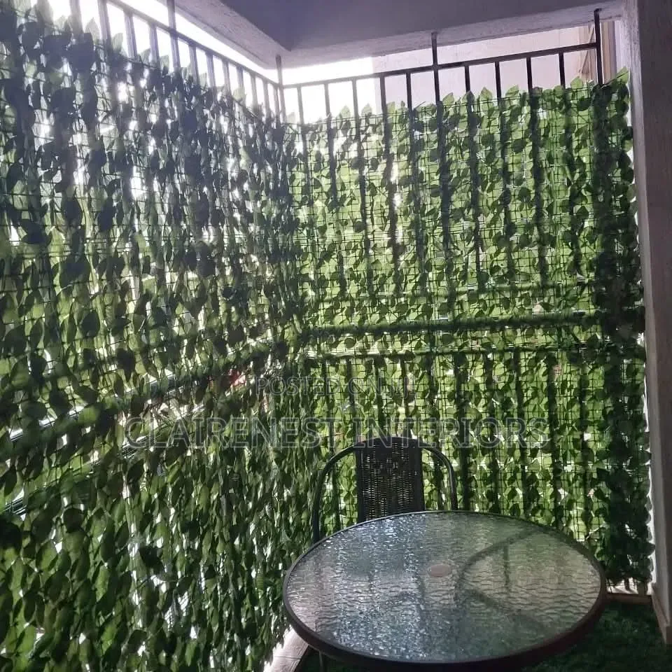 Bringing Nature to the Balcony With Artificial Green Privacy Fence