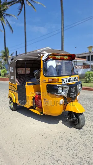 Bajaj RE 2024 Yellow